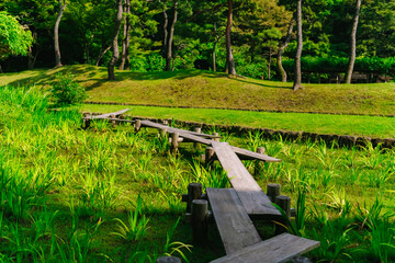 wooden bridge over the river