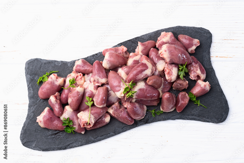 Poster Raw chicken giblets hearts , meat background