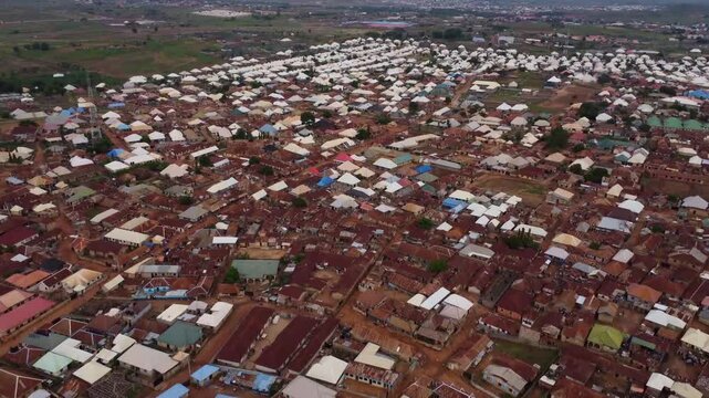Wide angle drone shot city in Nigeria. Poverty and overpopulation problem
