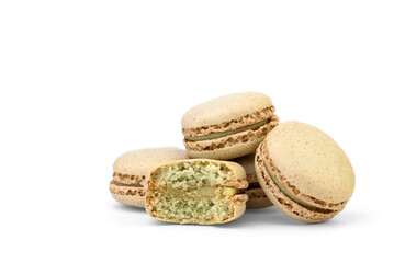 Macaroons with pistachio filling isolated on white background.