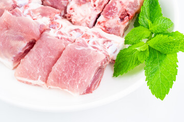 A plate of fresh pork spine