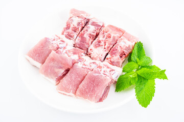 A plate of fresh pork spine