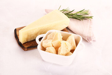 Chopped Italian hard parmesan cheese