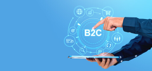 A person using a digital tablet with a B2C concept hologram on a blue background, highlighting business and consumer icons, illustrating an internet driven business network