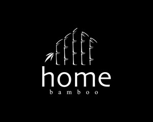 Fototapeta premium Creative shadows of bamboo that form a house with a logo background