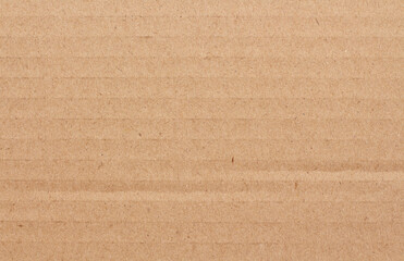 Cardboard sheet texture background, detail of recycle brown paper box pattern.
