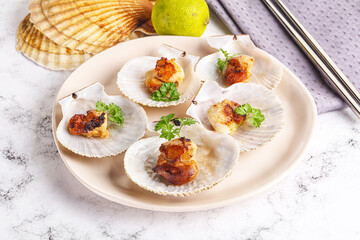 Grilled scallops shell with butter