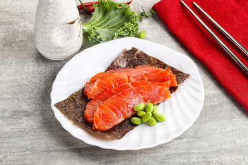 Sliced salmon sashimi in the plate
