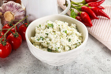 Curd cheese with green herbs
