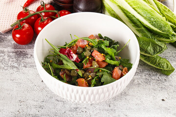 Salad with salmon and arugula