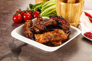 Grilled pork ribs in barbecue sauce