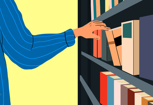 Hand of student picking book from bookshelf against yellow background