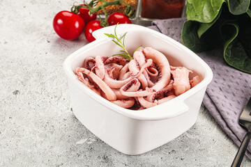 Marinated squid tentacles in the bowl