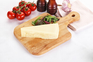 Piece Italian hard parmesan cheese