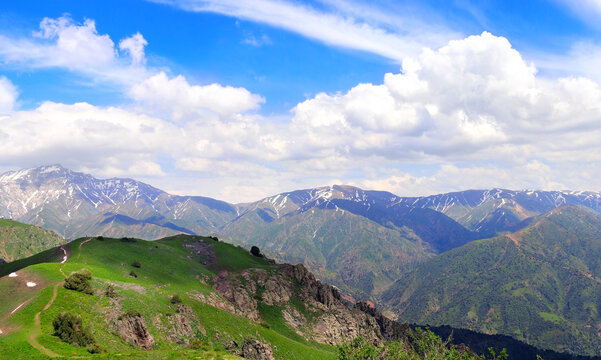 Beautiful landscape in Chimgan mountains, Tashkent region. Aerial view of idyllic mountain scenery in Western Tien Shan Mountains near Charvak Lake, Uzbekistan