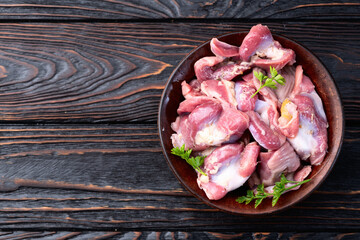Raw chicken giblets gizzard ( stomach ) , meat background