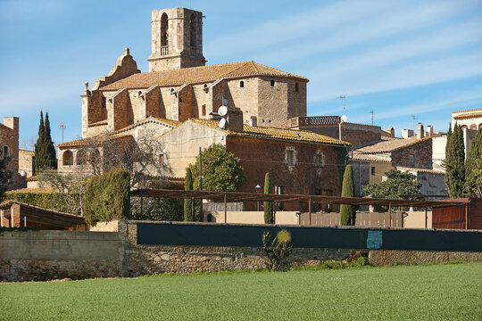 Traditional medieval village in Catalonia. St. Vicenc church. Girona, Spain