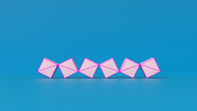 Paper cubes side by side on blue background