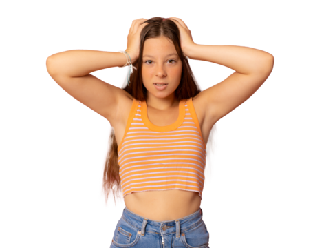 Angry teenager girl in casual clothes looking at the camera over transparent background