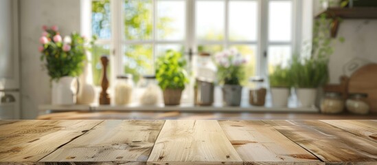 Bleached wooden table on blurry kitchen summer window backdrop