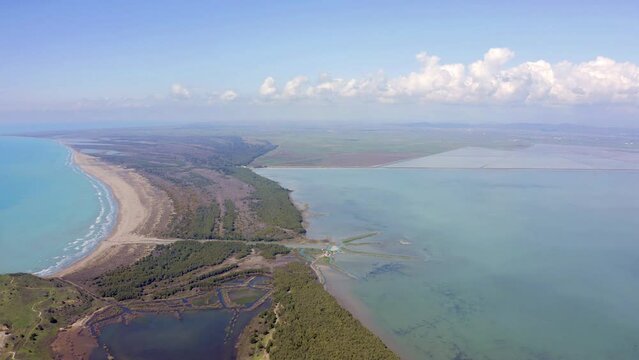 4K aerial - a bird's eye view&nbsp;video (Ultra High Definition) of Zvernec Beach. Attractive seascape of Adriatic sea. Fantastic morning scene of Albania, Europe. Beauty of nature concept background.