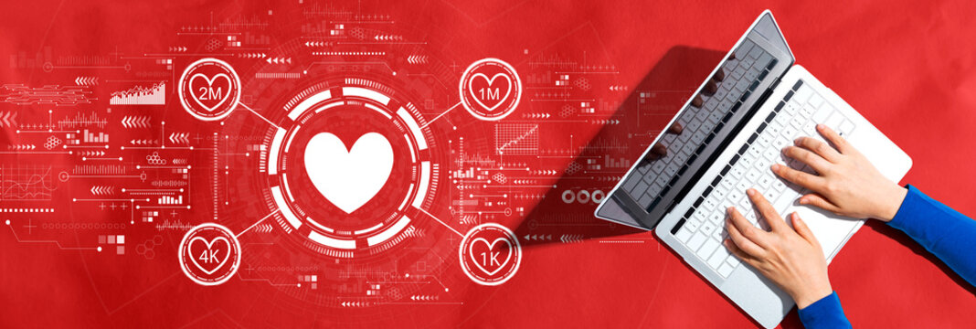 Get more likes concept with person using a laptop computer