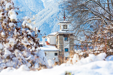 Houses and snow mountains panorama in Bansko, Bulgaria