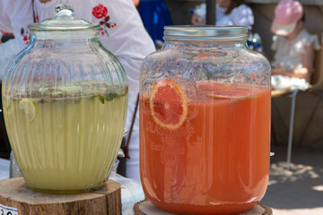 Jars of fresh lemonade and soft drink
