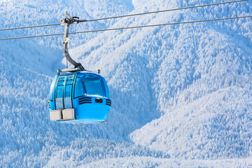 Bansko cable car cabin and snow peaks, Bulgaria