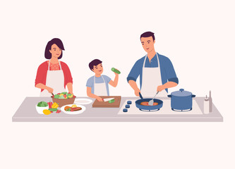 Family Preparing Food Together In The Kitchen. Smiling Little Son In Apron Cutting Cucumber With Knife. Father Cooking Steak With Frying Pan. Mother Making Salad.