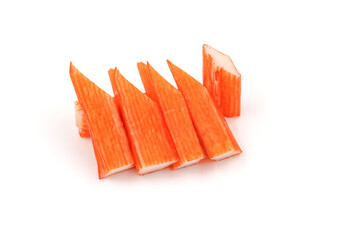 Crab sticks on a white background. Eaten with wasabi. Crab sticks have a lot of selenium and...