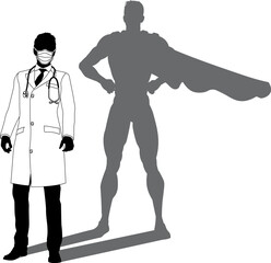 A superhero medical doctor man health care worker revealed by his shadow silhouette as a super hero in a cape.