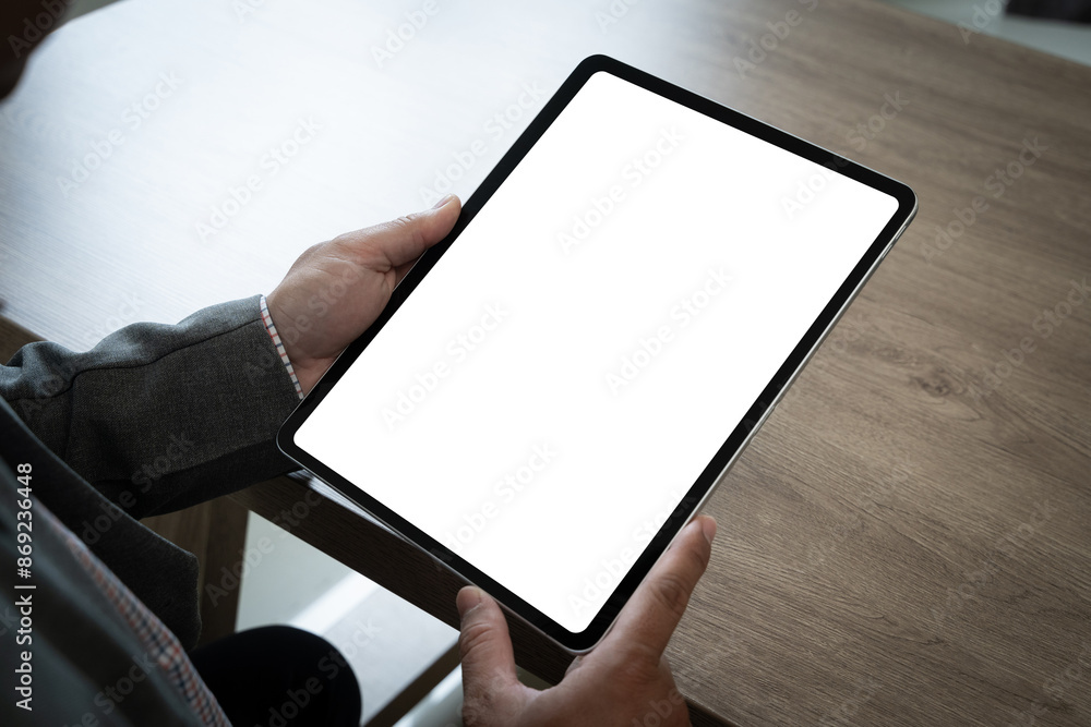 Poster businessman using tablet with blank screen for design mockup device tablet with blank screen for des