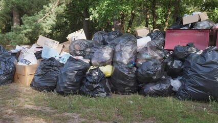 Minsk, Belarus - June 26, 2024: Environmental pollution problem garbage bags