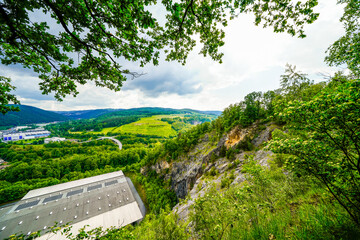 View from the Oestrich castle hill near Iserlohn. Landscape with green nature and mountains.
