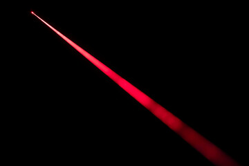 Close up of laser beam isolated on black background