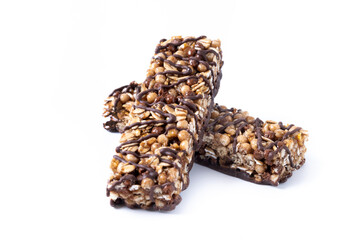 Healthy Muesli bars with nuts and black chocolate isolated on white background