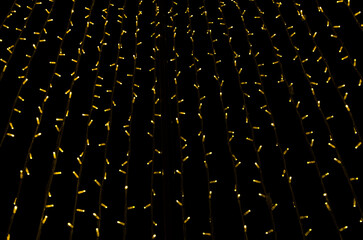 Fototapeta premium christmas decor yellow led lights close up