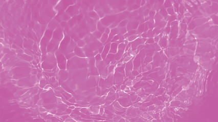 Pink water bubbles on the surface ripples. Defocus blurred transparent pink colored clear calm water surface texture with splash and bubbles. Water waves with shining pattern texture background