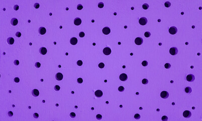 A surface made of cement plaster, with the texture of a plaster wall, in a deep dark purple color, with round holes of different sizes, is also used for wrapping three-dimensional models, a design