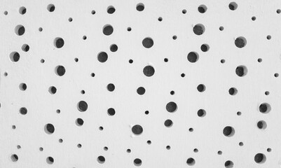 A surface made of plaster of cement, with the texture of a plaster wall, in the color of white deep dark dark light, with round holes of different sizes, is also used for wrapping 3d models