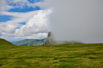 Landscape with the Fagarasi mountains in Romania on a summer day.