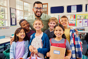 Happy elementary students back to school with teacher