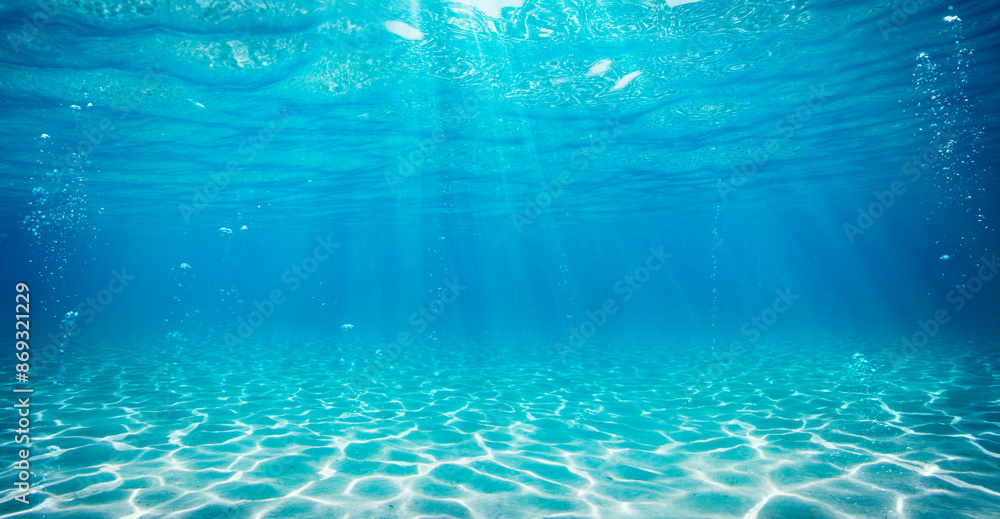 Wall mural undersea in light blue sea with sand - water with abstract sunshine