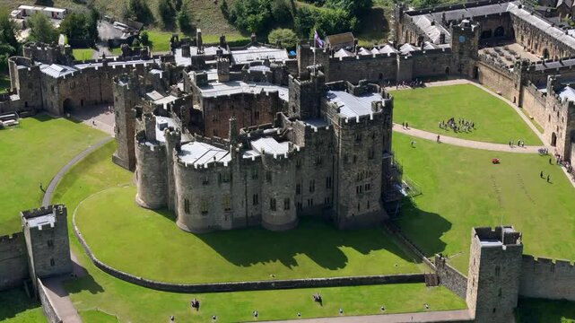 Aerial drone footage of Alnwick Castle in Northumberland in summer