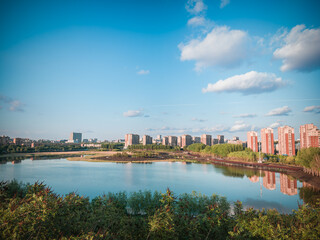 Naklejka premium Beautiful city street scene under blue sky, Changchun, China