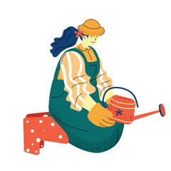 Woman Gardening in Overalls With Watering Can