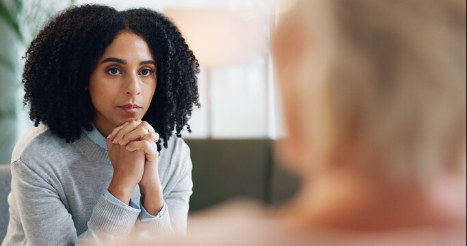 Counseling, fear and woman in consultation with psychologist for advice, support and comfort for depression. Psychology, mental health or patient with therapist for anxiety, stress or healing therapy