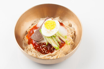  A food made by boiling ingredients such as onions and peppers, then pouring the cooled soy sauce over prepared crabs several times and allowing them to age.