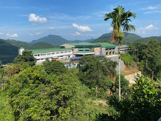 Disorderly housing community in the rugged terrain of a mountainous rural town